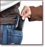 A wage attachment is like a creditor taking your wallet every paycheck. Image of man in business suit removing the wallet from the pocket of a man in jeans and casual clothes.